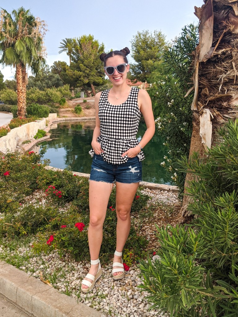 \"striped-sunglasses-pattern-mixing-checkered-top-space-buns\"
